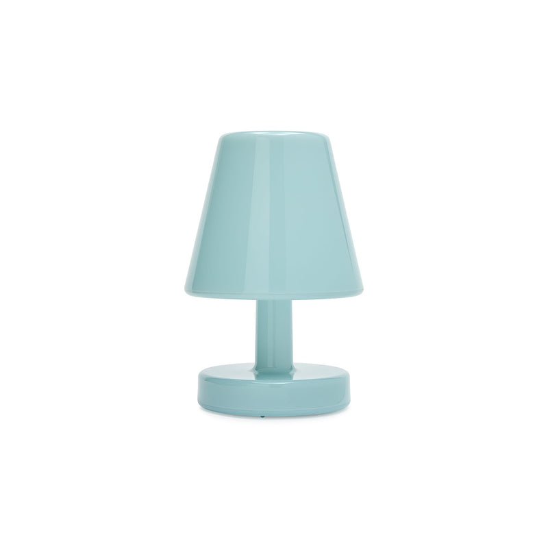 Edison the Ambiance in polar blue is a wireless table lamp designed to create instant cozy lighting.