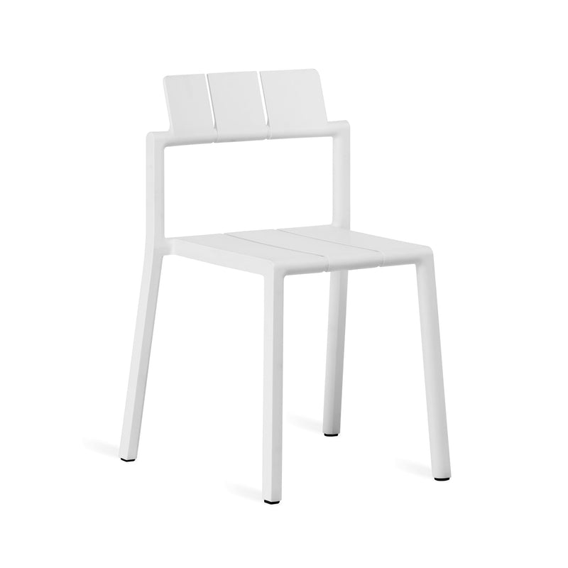 Yard chair by TOOU Design in white, showcasing its sleek geometric design, durable polypropylene material, and stackable functionality.